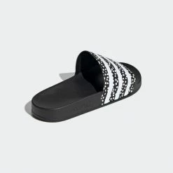 ADIDAS ADILETTE CORE BLACK SNEAKERS